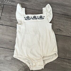 EUC Carters 12 months girls ruffle romper cream with black embroidery